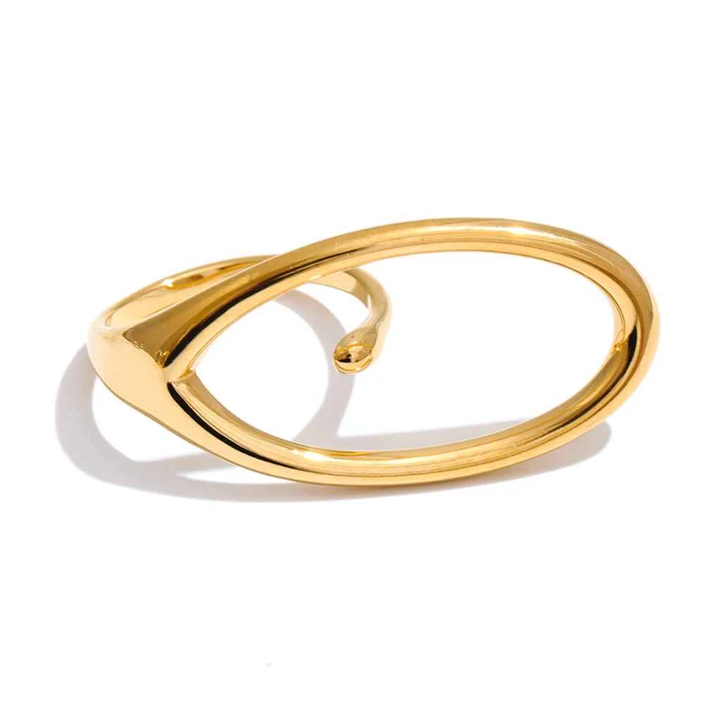 Geometric ring in 18K gold-plated stainless steel.