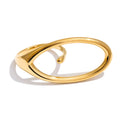 Geometric ring in 18K gold-plated stainless steel.
