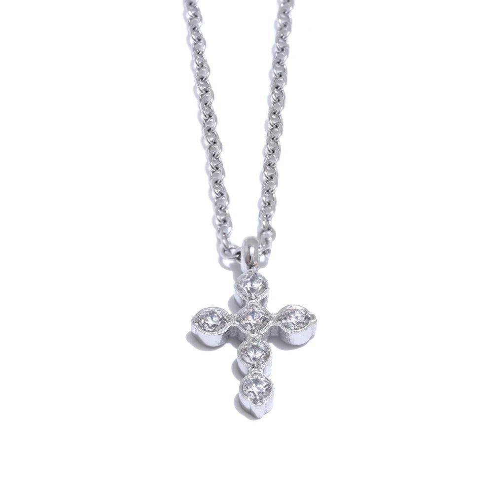 Cubic zirconia cross geometric necklace in gold-plated stainless steel with cubic zirconia.