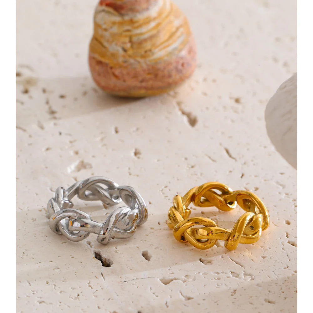Geometric chain ring in 18K gold-plated stainless steel.