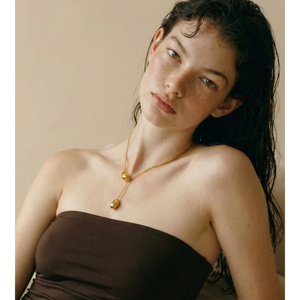 Geometric necklace in gold-plated stainless steel.