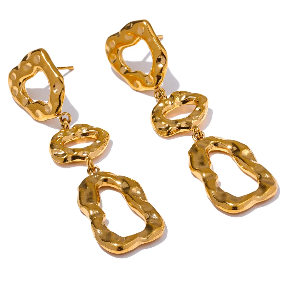 Gold-plated stainless steel earrings featuring a unique design resembling a shoe print.