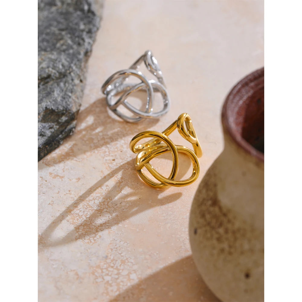 Geometric ring in gold-plated stainless steel.