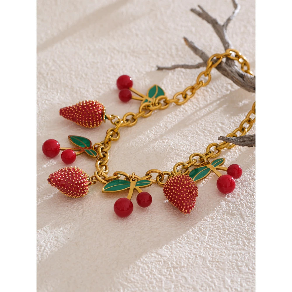 Red acrylic enamel necklace in gold-plated stainless steel with acrylic and enamel.
