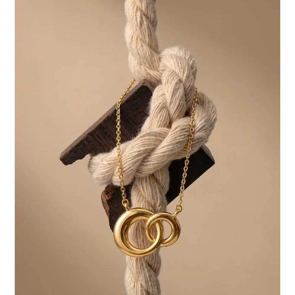 Coin geometric necklace in gold-plated stainless steel.