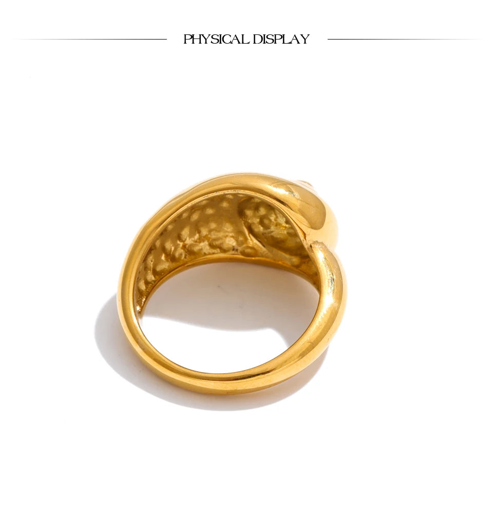 Geometric ring in 18K gold-plated stainless steel.