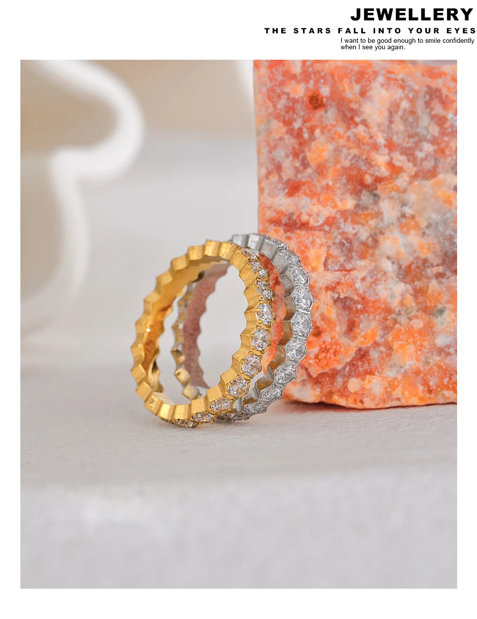 White cubic zirconia geometric ring in gold-plated stainless steel with cubic zirconia.