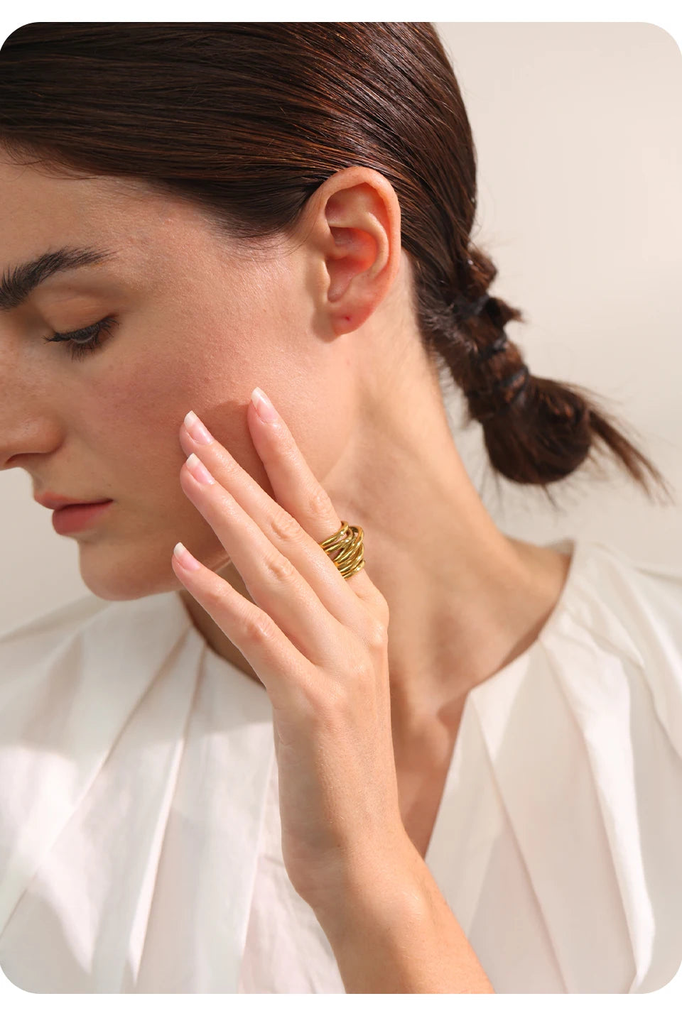 Geometric ring in 18K gold-plated stainless steel.
