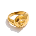 Geometric ring in 18K gold-plated stainless steel.
