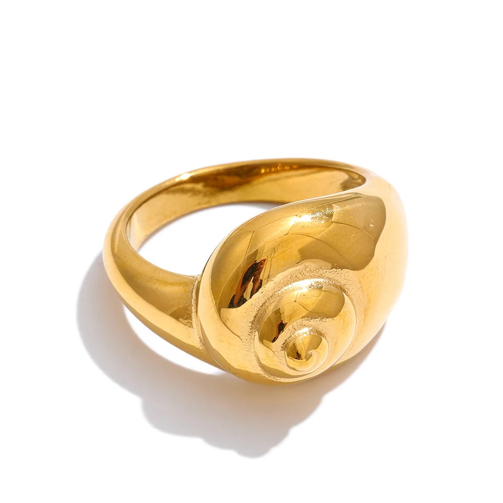 Geometric ring in 18K gold-plated stainless steel.