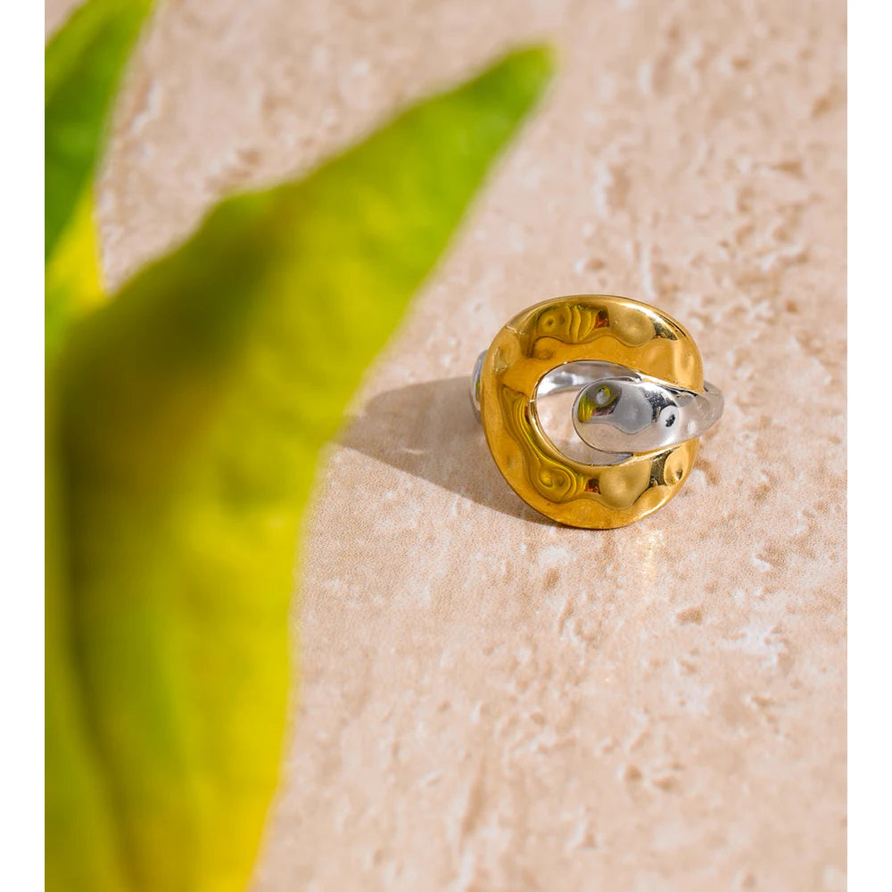 Geometric ring in 18K gold-plated stainless steel.