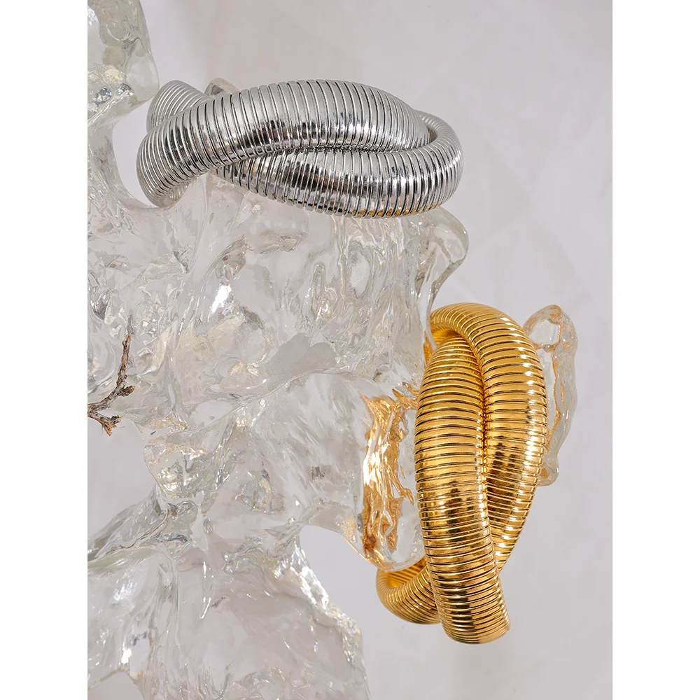 Geometric bracelet in gold-plated 316L stainless steel.