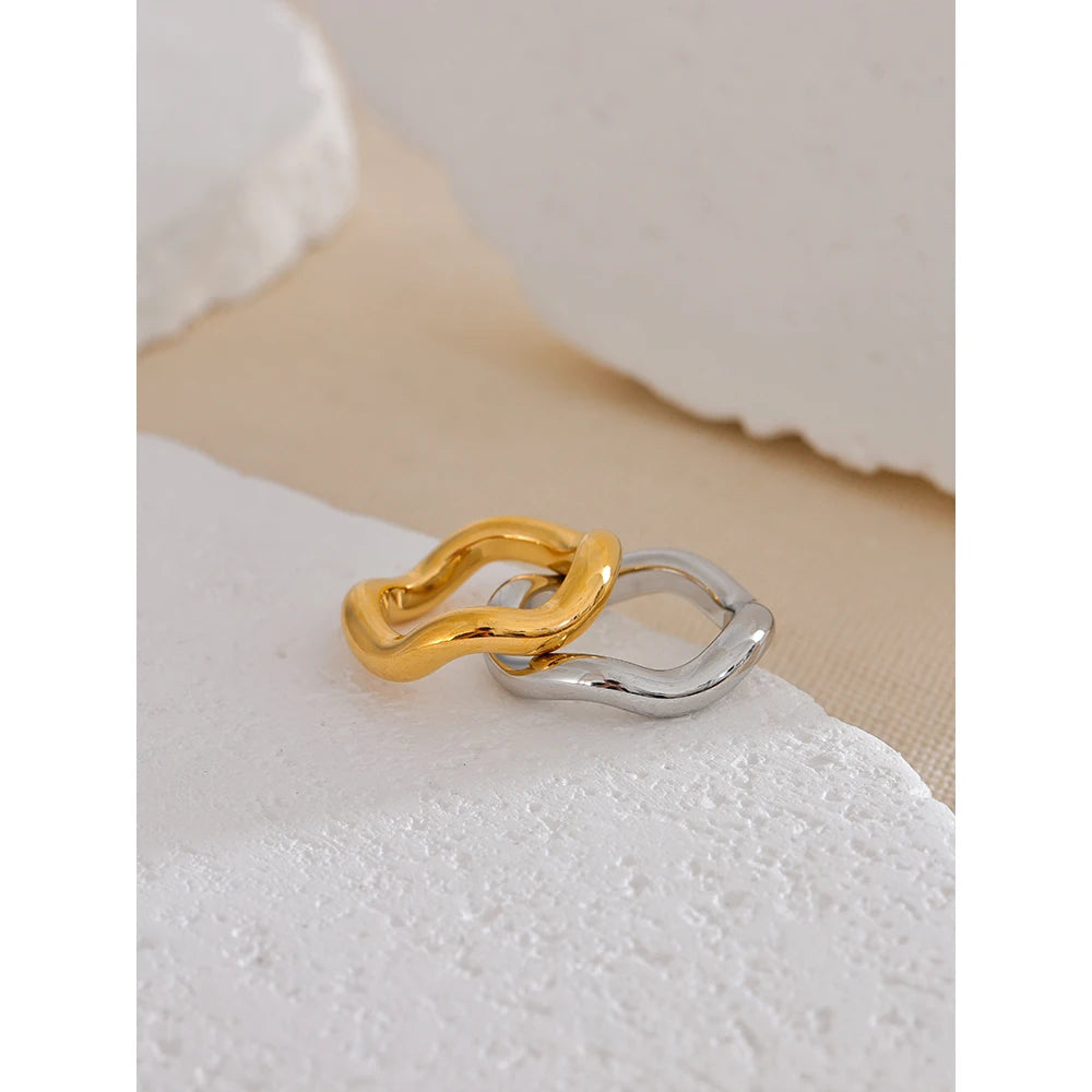 Geometric ring in 18K gold-plated stainless steel.