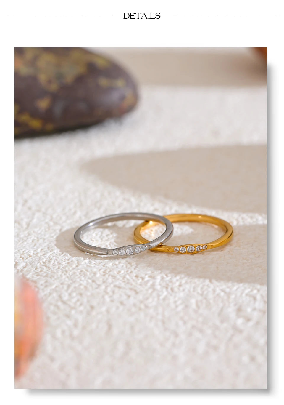 Cubic zirconia geometric ring in 18K gold-plated stainless steel with cubic zirconia.