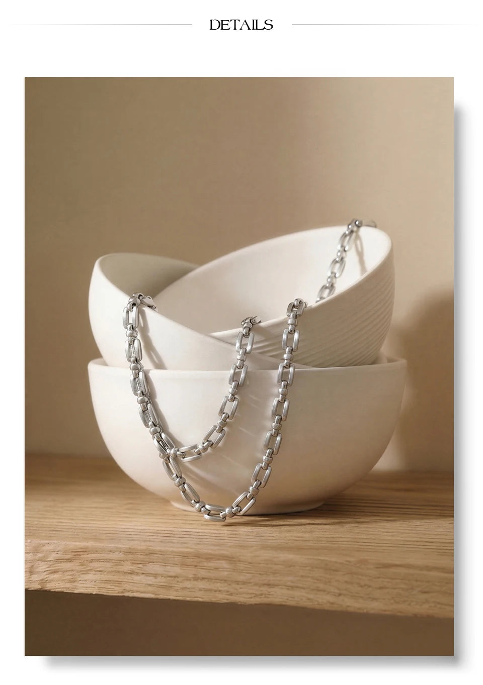 Geometric chain necklace in gold-plated stainless steel.