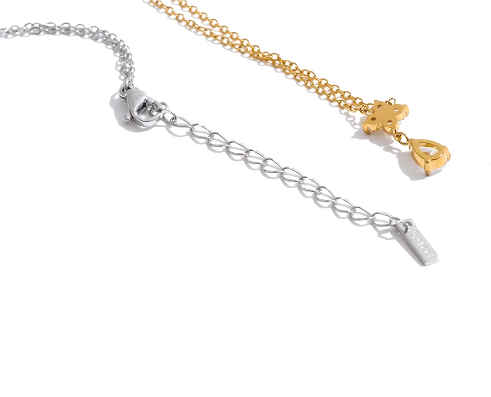 Cubic zirconia flower necklace in gold-plated stainless steel with cubic zirconia.