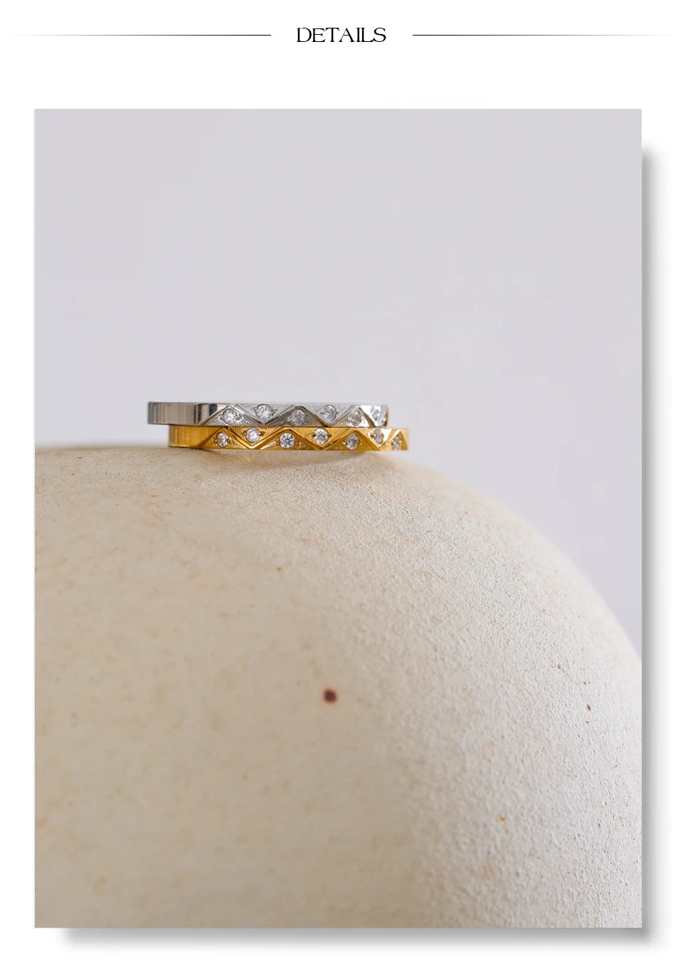 Cubic zirconia geometric ring in gold-plated stainless steel with cubic zirconia.