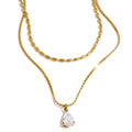 Cubic zirconia geometric layered necklace in gold-plated stainless steel with cubic zirconia.