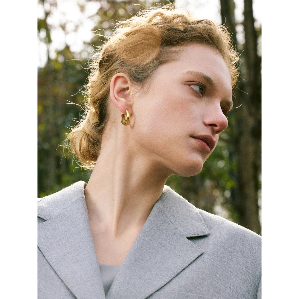 Geometric earrings in gold-plated 316L stainless steel.