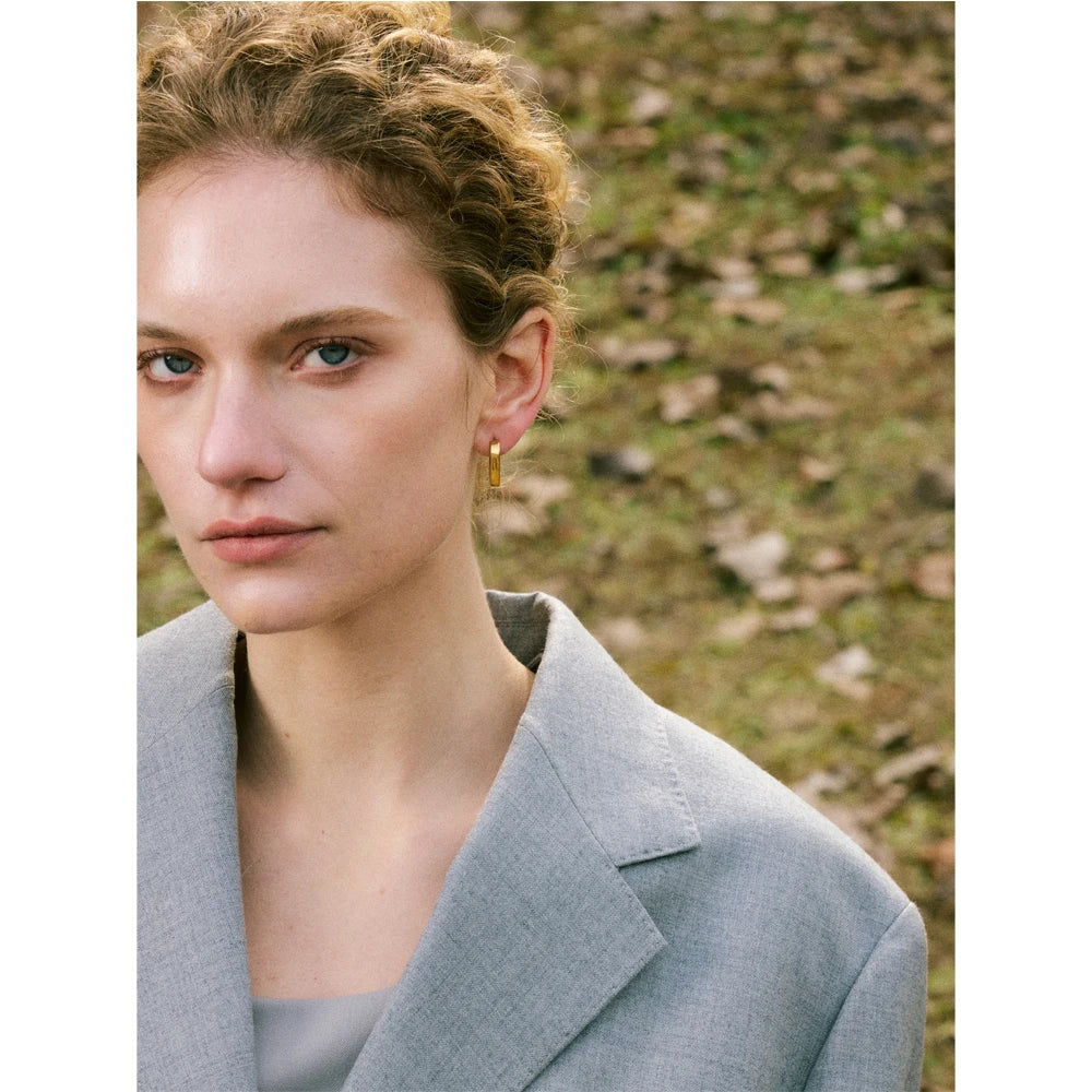 Geometric earrings in gold-plated stainless steel.