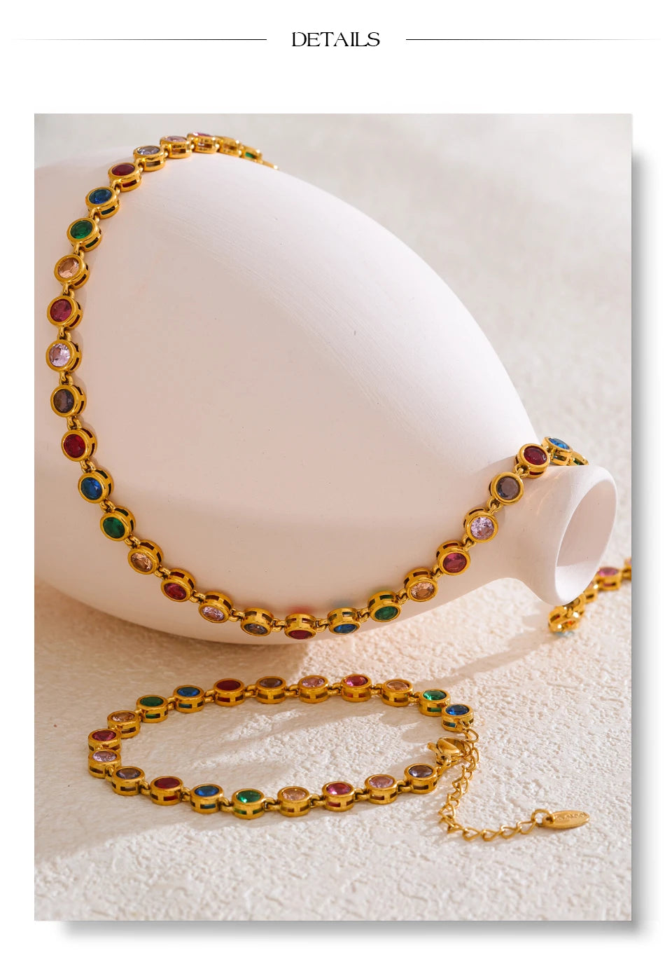 Cubic zirconia multi-color geometric necklace in gold-plated stainless steel with cubic zirconia.