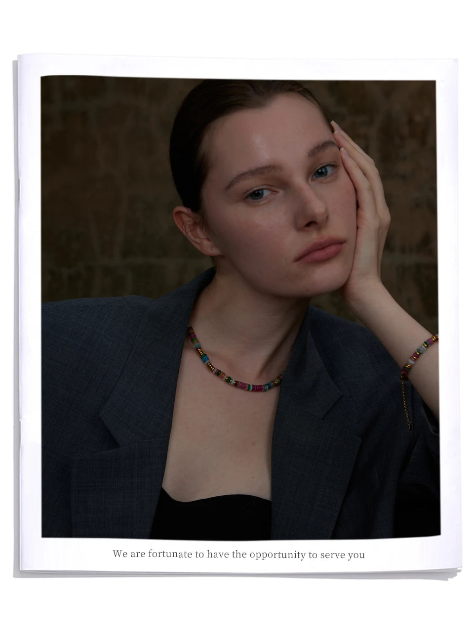 Natural stone beaded multi-color necklace in gold-plated stainless steel with natural stone.