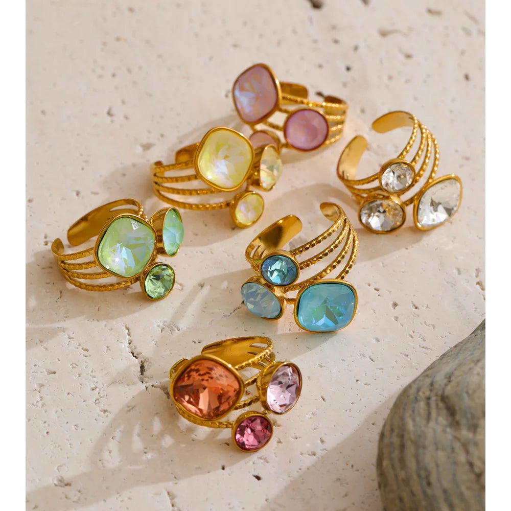 Crystal multi-color geometric ring in 18K gold-plated stainless steel with crystal.