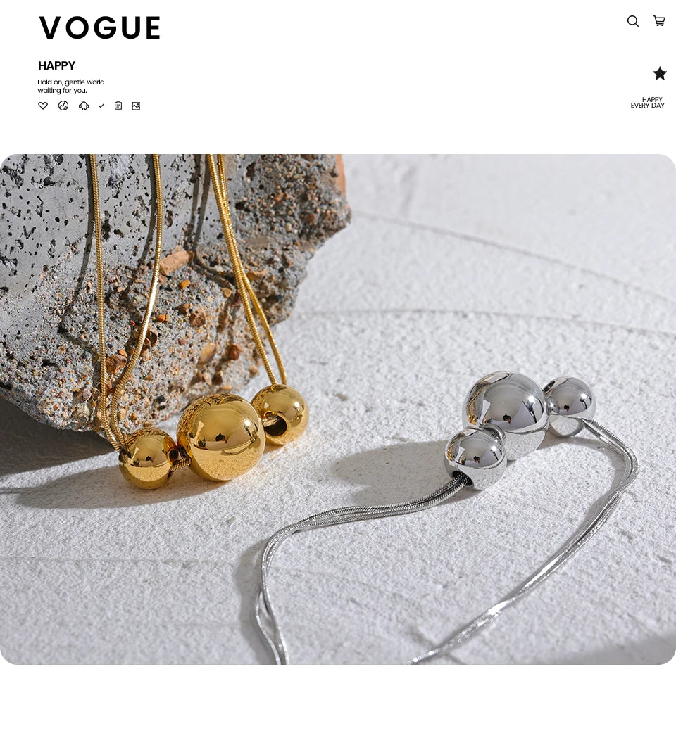 Beaded geometric chain necklace in gold-plated 316L stainless steel.
