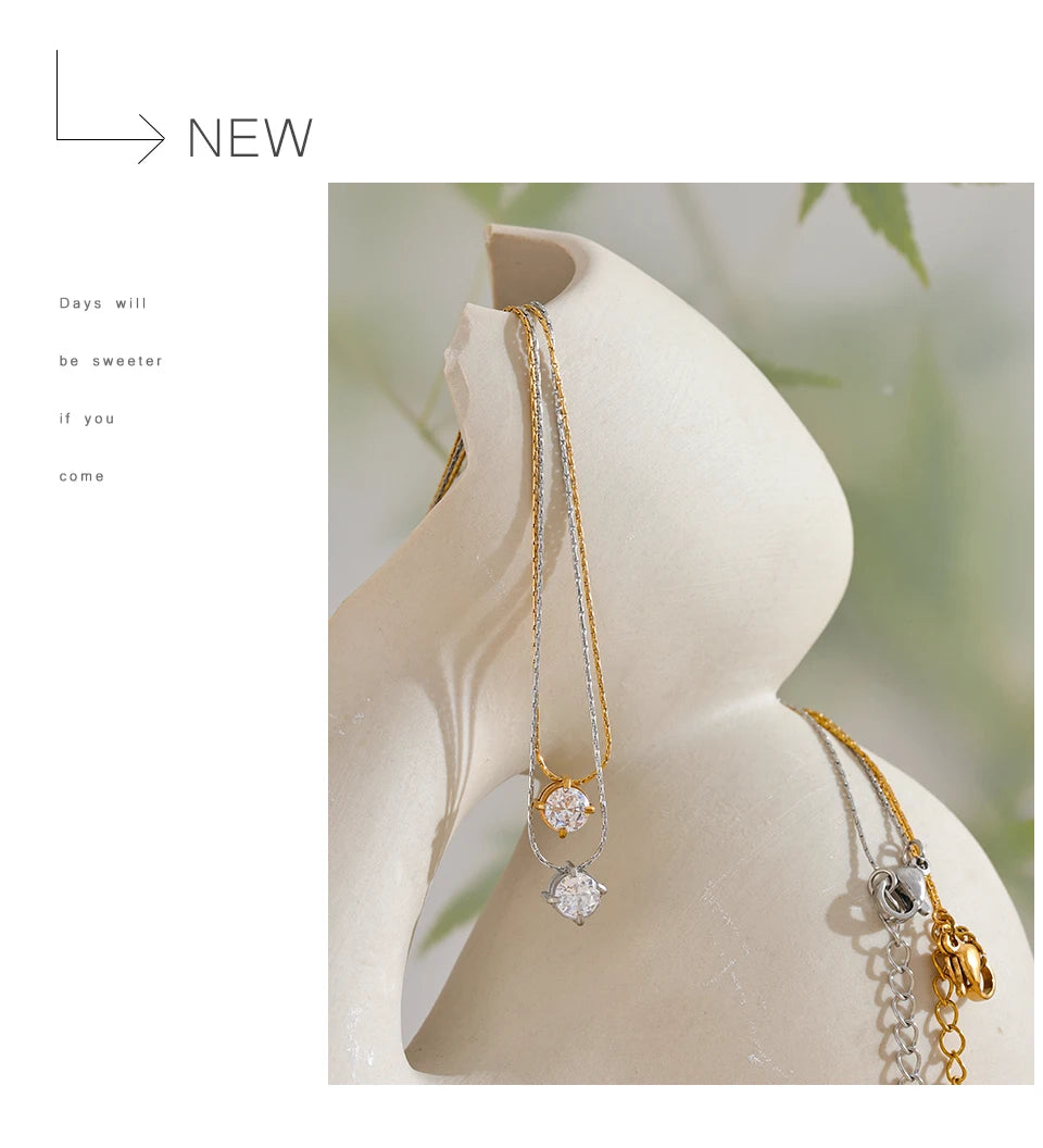 Cubic zirconia geometric necklace in gold-plated stainless steel with cubic zirconia.