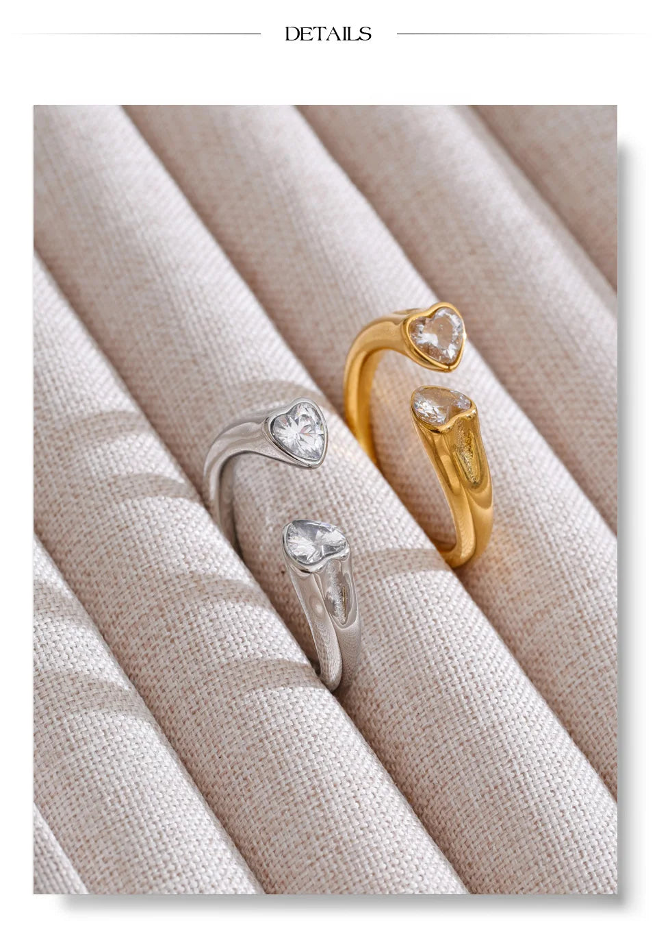 Cubic zirconia heart ring in 18K gold-plated stainless steel with cubic zirconia.