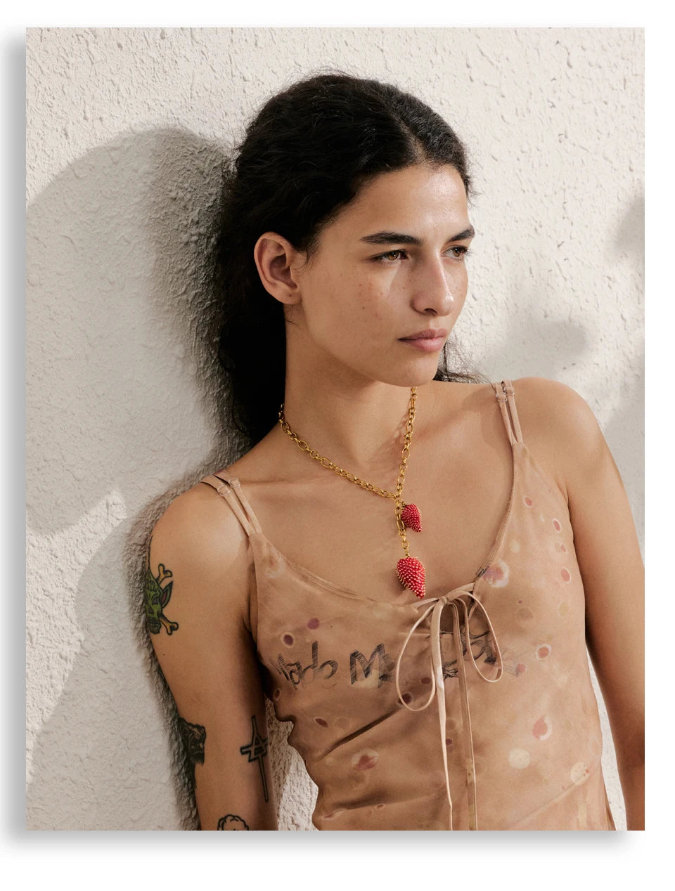 Red heart geometric necklace in gold-plated stainless steel.