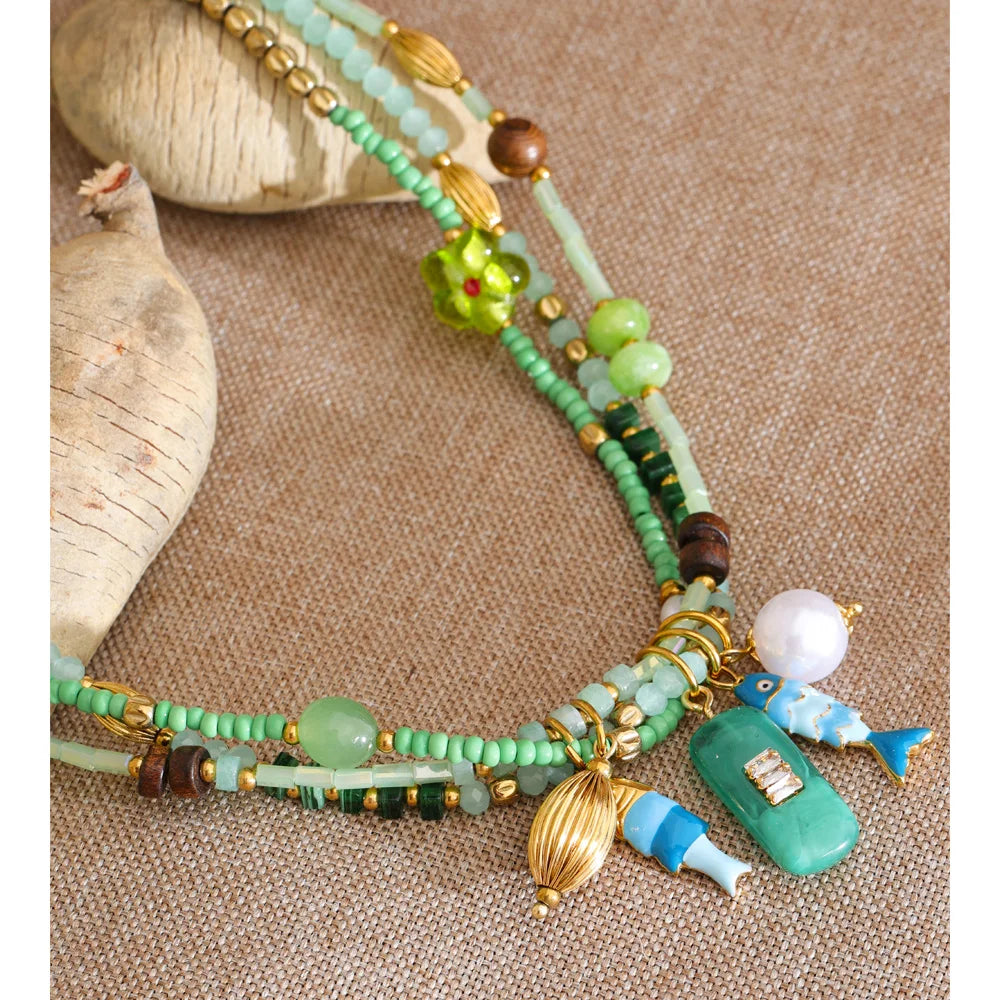 Pearl crystal geometric necklace in gold-plated stainless steel with pearl and crystal.