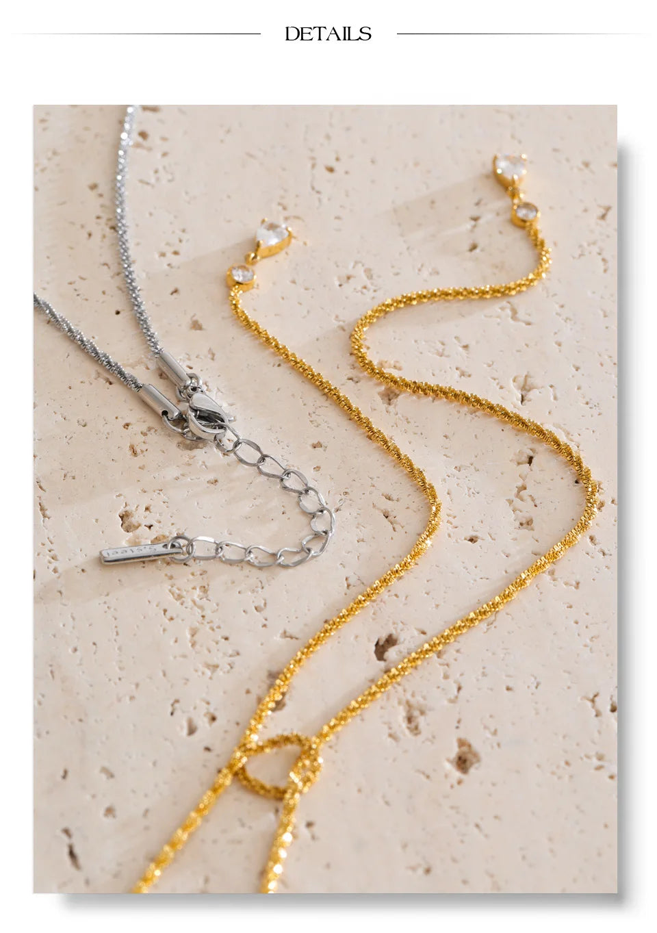 Cubic zirconia geometric chain necklace in gold-plated stainless steel with cubic zirconia.