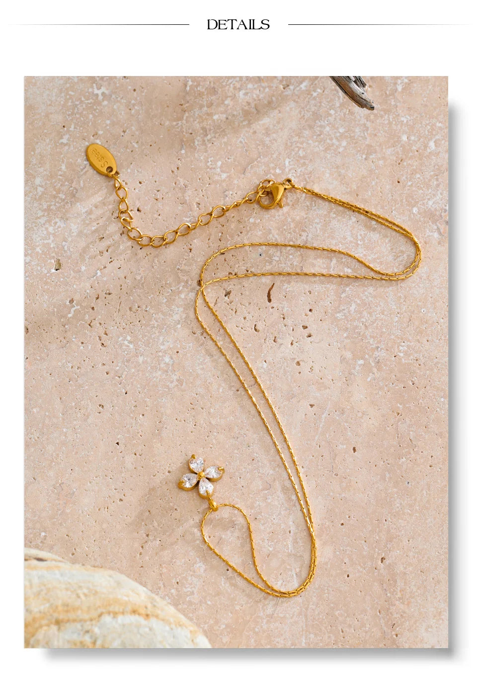 Cubic zirconia flower necklace in gold-plated stainless steel with cubic zirconia.