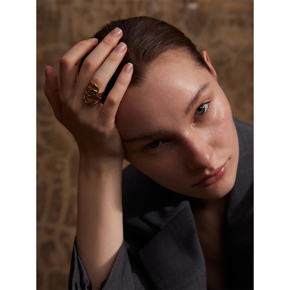 Geometric ring in gold-plated stainless steel.