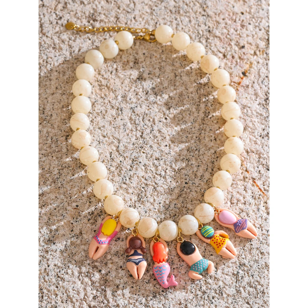 Resin glass natural stone necklace in gold-plated stainless steel with natural stone and resin.