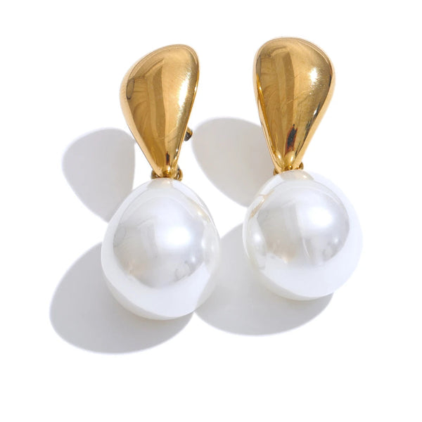 Gold-plated pearl earrings with a white background.