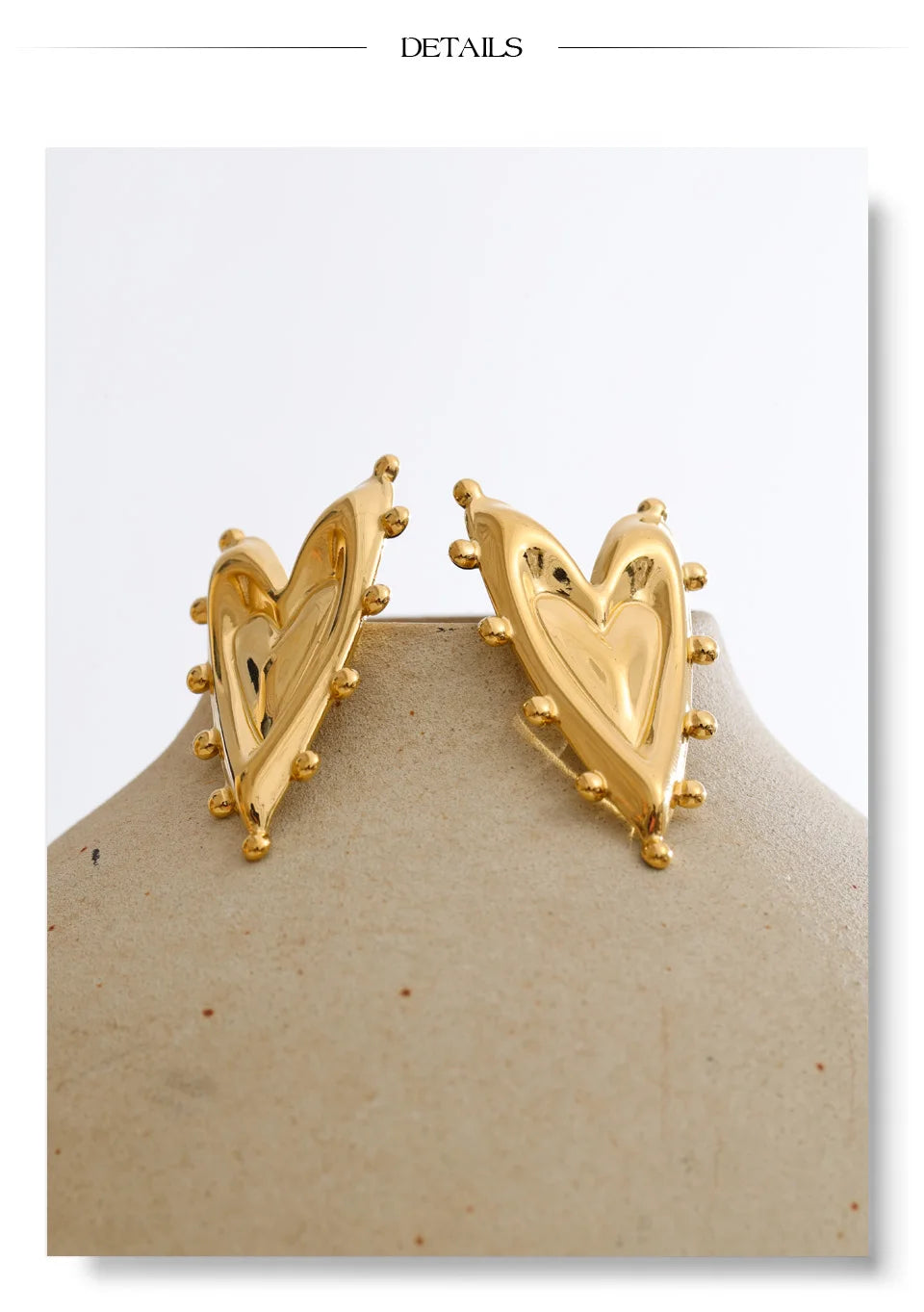 Heart earrings in gold-plated stainless steel.