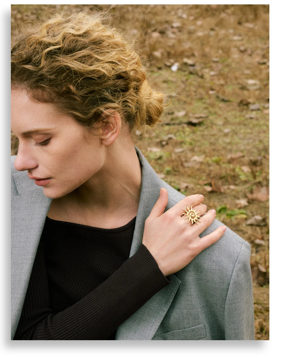 Sun geometric ring in 18K gold-plated stainless steel.