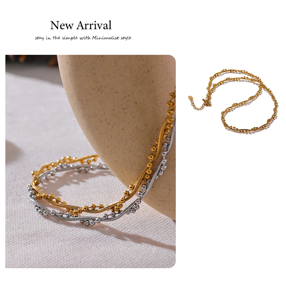 Geometric chain necklace in gold-plated stainless steel.