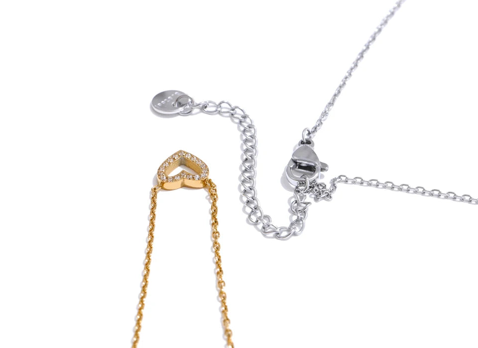 Cubic zirconia heart necklace in gold-plated stainless steel with cubic zirconia.