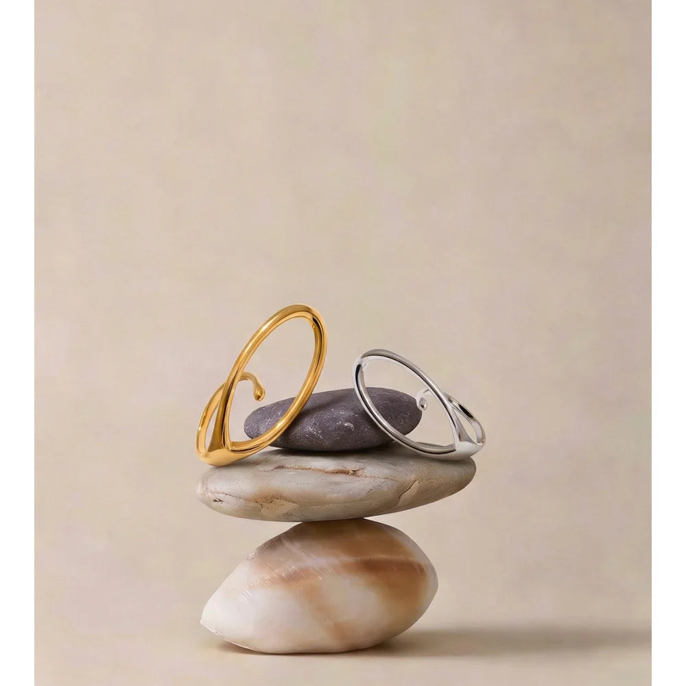 Geometric ring in 18K gold-plated stainless steel.