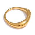 Hammered minimalist geometric ring in gold-plated stainless steel.