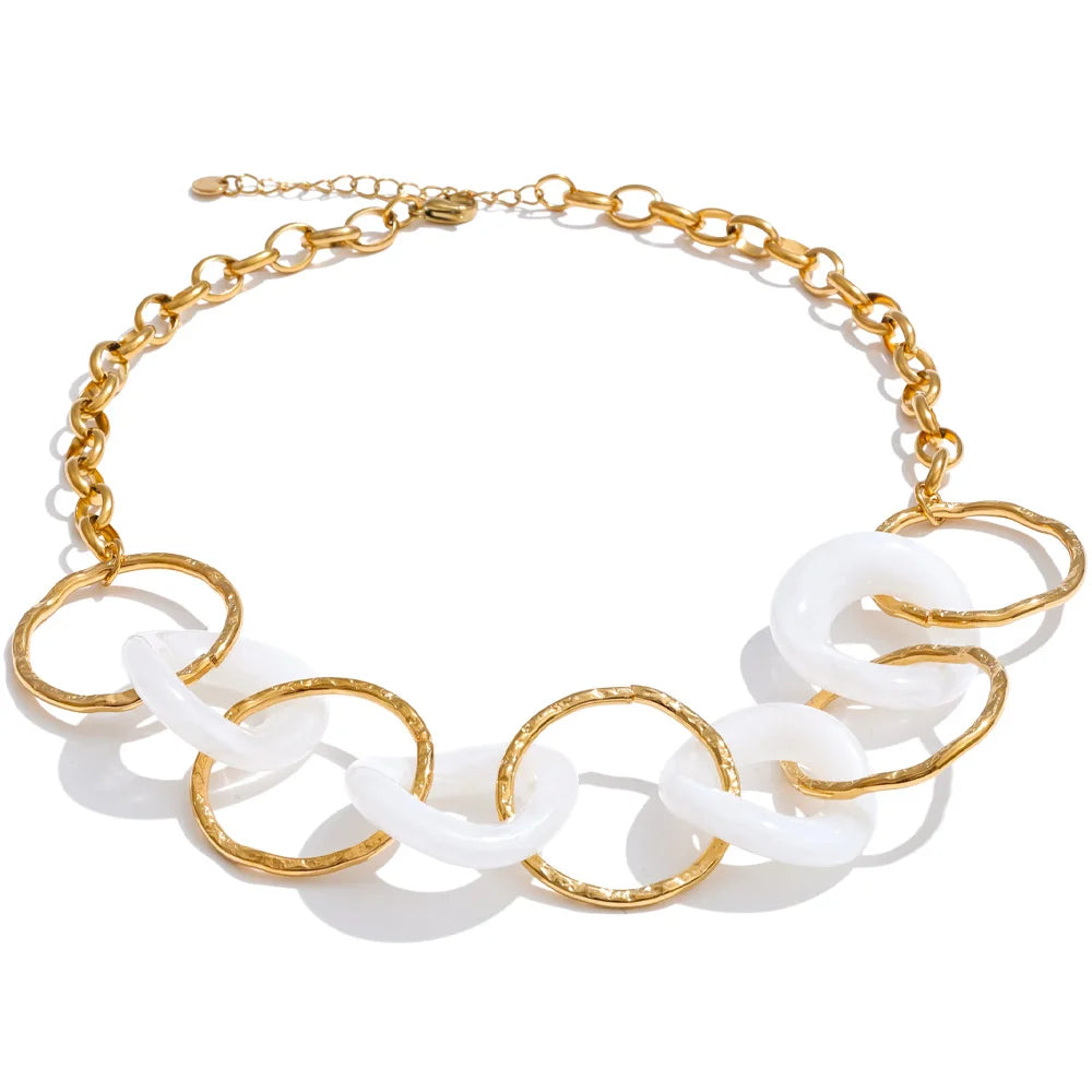 Resin acrylic geometric necklace in gold-plated stainless steel with resin and acrylic.