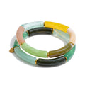Resin acrylic geometric bracelet in gold-plated stainless steel with resin and acrylic.