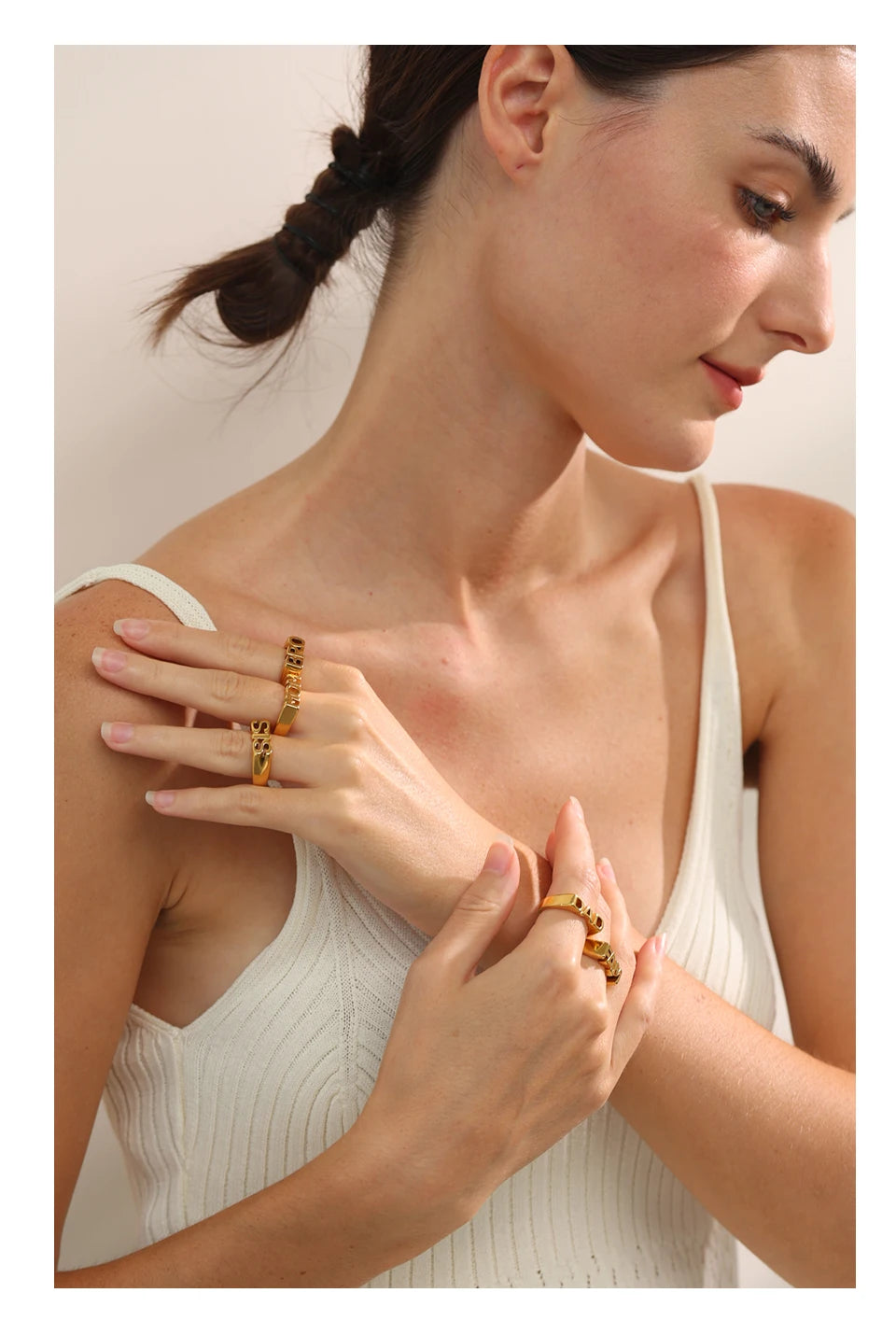 Geometric ring in 18K gold-plated stainless steel.