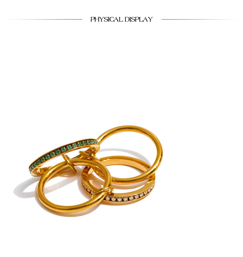 White cubic zirconia geometric ring in 18K gold-plated stainless steel with cubic zirconia.