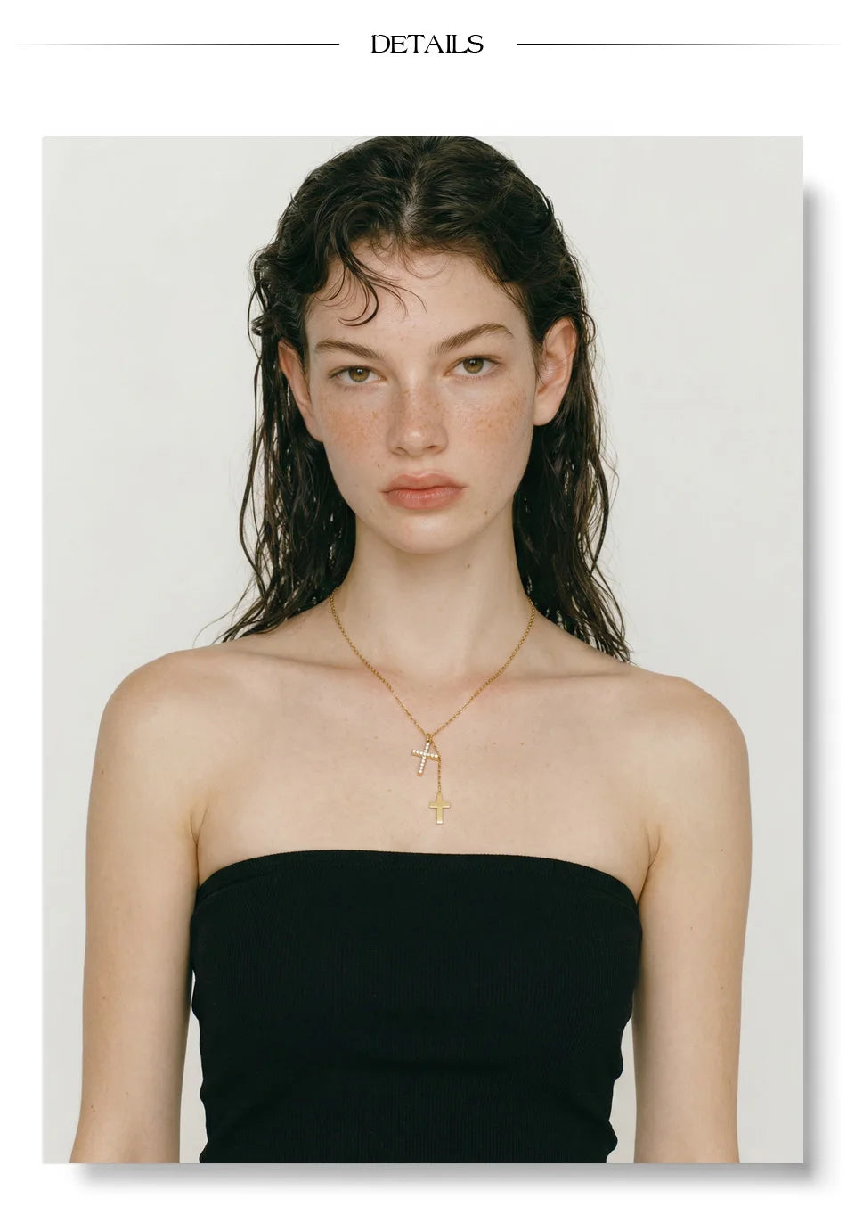 Cubic zirconia cross chain necklace in gold-plated stainless steel with cubic zirconia.