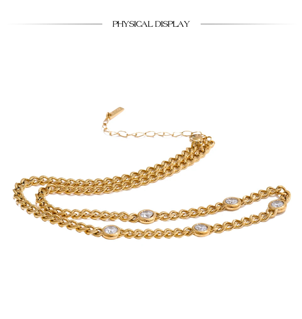 Cubic zirconia geometric chain necklace in gold-plated stainless steel with cubic zirconia.
