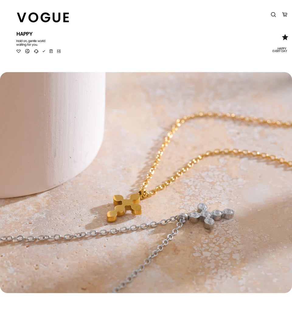 Cubic zirconia cross geometric necklace in gold-plated stainless steel with cubic zirconia.